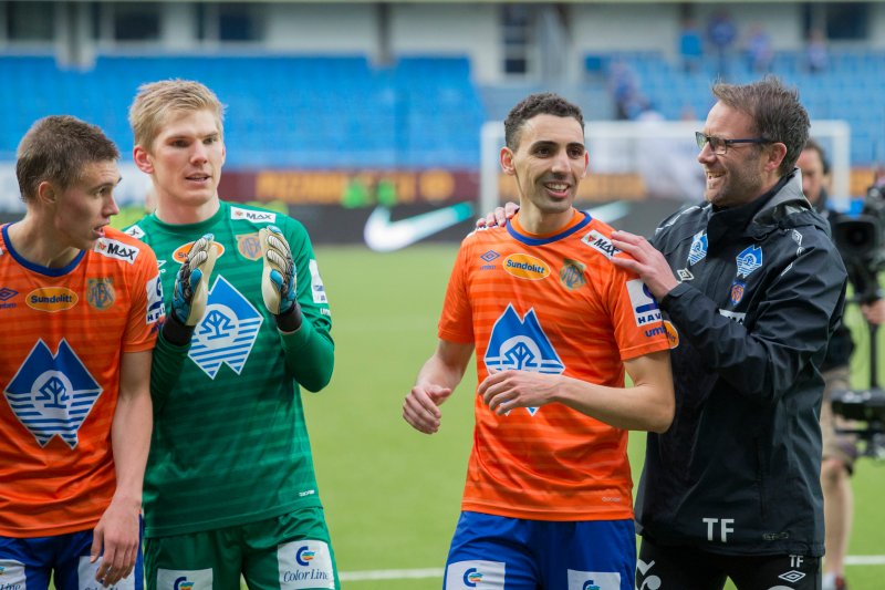 Daniel, Andreas, Mos og Trond feirer 0-1 seieren i Molde. Foto: NTB Scanpix
