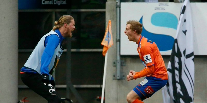 Peter Orry Larsen (t.h.) og Tor Hogne Aarøy feirer 1-0 over RBK i 2014. Foto: Svein Ove Ekornesvåg / NTB