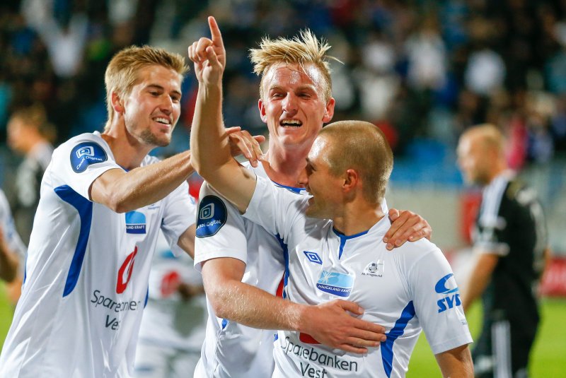 Haugesunds Daniel Bamberg (t.h.), Torbjørn Agdestein og Vegard Skjerve jubler etter 1-0 målet i eliteseriekampen i fotball mellom FKH og Rosenborg på Haugesund Stadion i 2014 .Foto: Jan Kåre Ness / NTB scanpix